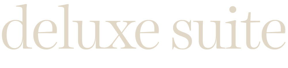 Deluxe Apartmani logo